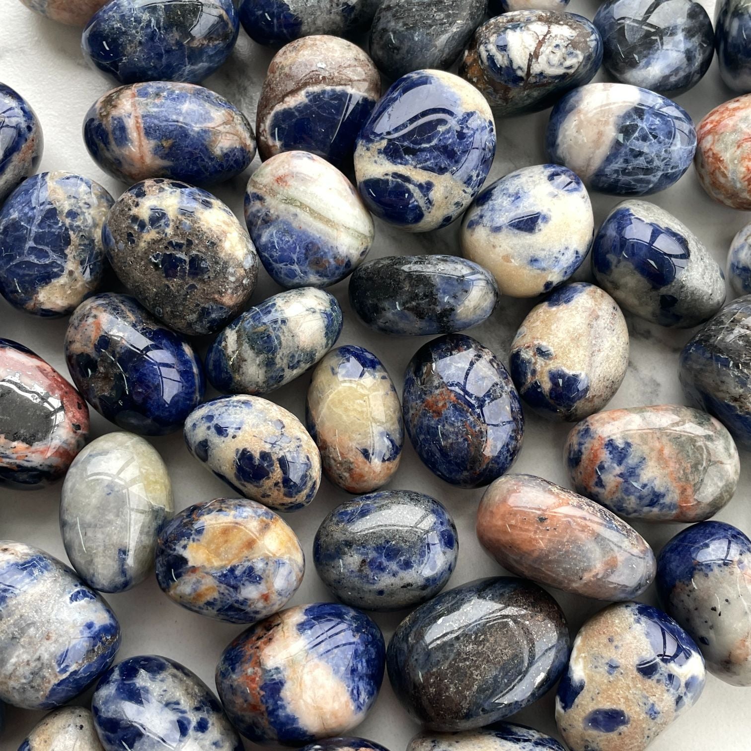 Sodalite Tumbled-200gms (12-15pc)